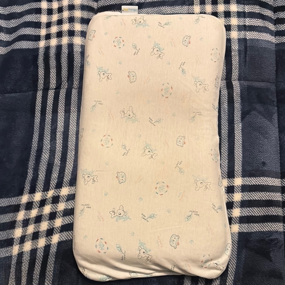 Baby pillow to keep baby’s head shape (bought in Amazon)